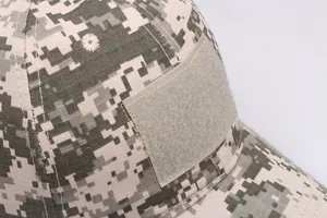Macro shot of tactical digital camouflage baseball cap with front hook-and-loop patch panel