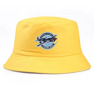 Yellow Flying Aces pilot bucket hat with vintage fighter plane logo and stitching