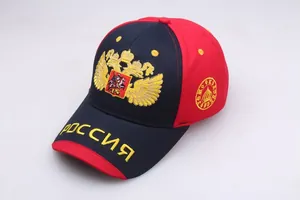 Close-up of navy blue baseball cap with gold double-headed eagle and Russia embroidery