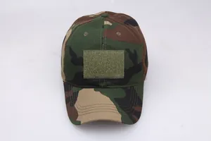 Top view of tactical camouflage baseball cap with green hook-and-loop front patch