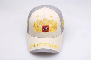 Detailed top view of embroidered double-headed eagle and Russian text on a baseball cap