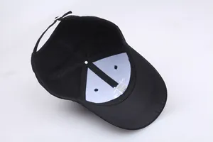 Black cotton hip hop baseball cap with adjustable metal buckle and interior structure view