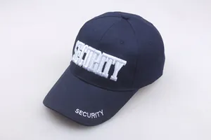 Close-up of white SECURITY embroidery on navy blue cotton baseball cap detail