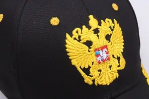 Black baseball cap with golden Russian double-headed eagle embroidery on the front crown