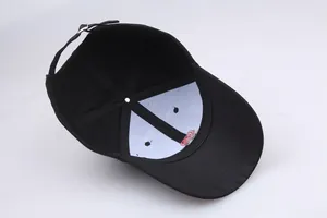 Adjustable black cotton baseball cap with red embroidery and metal buckle closure