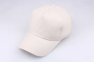 Detailed top view of a beige five-panel cotton baseball cap with reinforced stitching