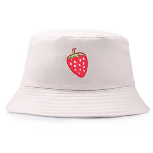 Minimalist beige cotton bucket hat with strawberry embroidery for sun protection