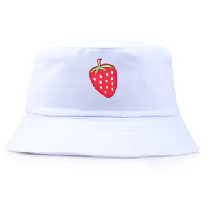 White cotton bucket hat with strawberry embroidery featuring a sun-protective brim