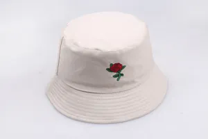 Detailed close-up of red rose flower embroidery on cotton canvas bucket hat
