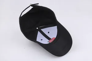 Black cotton baseball cap with red rose embroidery on brim and metal buckle strap