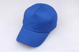 Detailed close-up of a royal blue cotton baseball cap with reinforced stitched brim