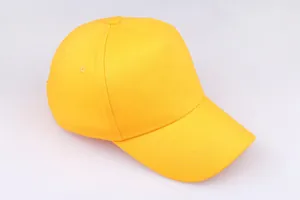 Detailed top view of a plain bright yellow baseball cap showing durable twill texture