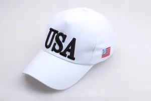Detail of embroidered USA text and American flag patch on white cotton baseball cap