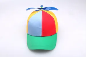 Colorful patchwork baseball cap with a blue spinning propeller on top for kids