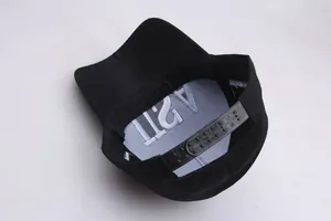 Detail view of cotton baseball cap interior featuring USA embroidery and snapback strap