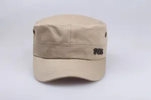 Detail view of khaki cotton flat top military cap with metal SPORTS logo and rivets