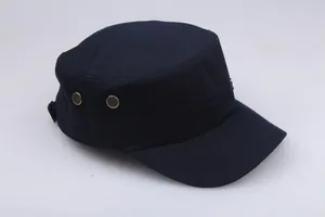 Detail of dark blue cotton cadet cap with metal ventilation eyelets and adjustable strap