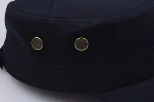 Detail of navy cotton cadet hat featuring metal eyelets and premium stitching