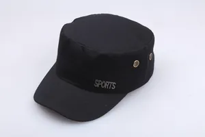 Detail of cotton flat top cap with metallic Sports emblem and side gold ventilation holes