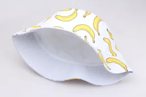 Detailed view of the fine stitching and fabric of this banana print white bucket hat
