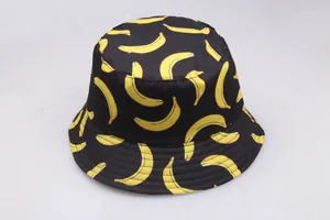 Close-up of yellow banana print on black cotton bucket hat with durable brim stitching