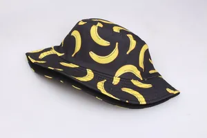 Detail of banana print on black reversible bucket hat showing clean stitching and fabric