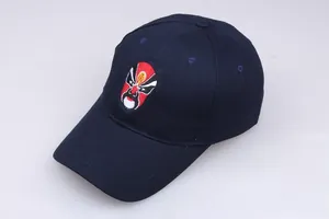 Detailed embroidery of Chinese Opera mask on navy blue cotton baseball cap crown