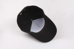 Internal structure of black cotton baseball cap with sweatband and reinforced lining
