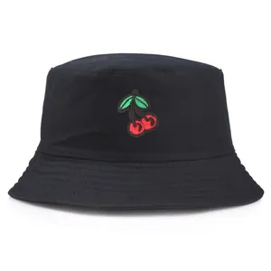 Classic black cotton bucket hat with detailed red cherry embroidery on the front side