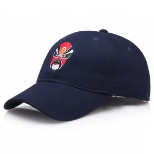 Navy blue cotton baseball cap with traditional Chinese opera mask embroidery and gold lettering