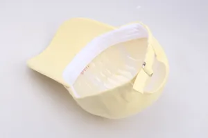 Detail view of cotton baseball cap inner structure with sweatband and adjustable buckle
