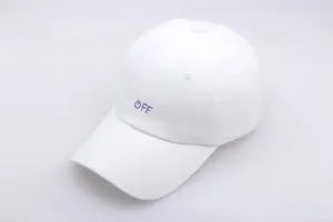 Close-up of a white cotton baseball cap featuring purple OFF text and power icon embroidery