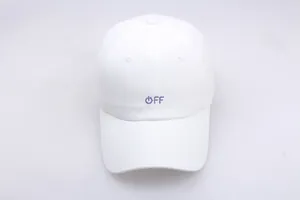 Close-up of purple OFF embroidery on a white cotton baseball cap with seam details
