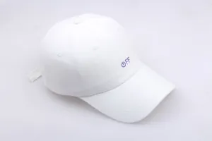 Detail of white cotton baseball cap showing purple OFF embroidery and fine stitching