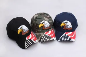 Detailed embroidery of an eagle and American flag stars on baseball cap brims