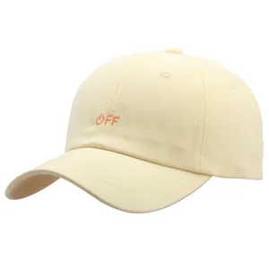 Cream cotton baseball cap with orange OFF embroidery and curved brim on white background