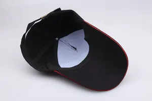 Detail view of adjustable metal buckle and inner cotton structure of black baseball cap