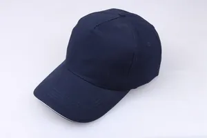 Detailed top view of a classic navy blue 5-panel cotton baseball cap with neat stitching