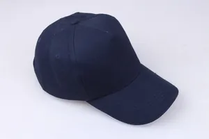 Detailed stitching on blue five-panel cotton baseball cap with reinforced curved brim