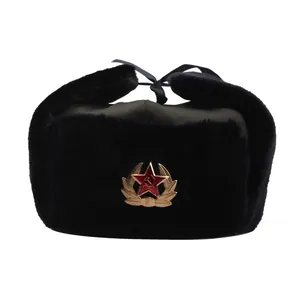 Winter Soviet ushanka hat with faux fur and hammer sickle badge on white background