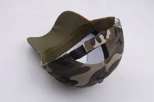 Detail of adjustable velcro strap and wash label on camouflage embroidered baseball cap