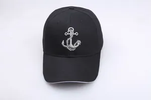 Classic black baseball cap with silver anchor embroidery and white sandwich brim detail