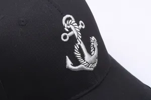 Classic black twill cotton baseball cap featuring detailed white 3D anchor embroidery