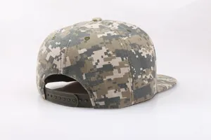 Detail view of the digital camouflage snapback cap showing adjustable plastic strap closure
