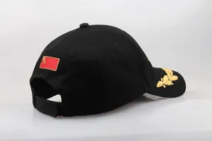 Close-up of red Soviet CCCP sickle and hammer embroidery on black baseball cap back