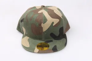 Detailed view of camo snapback hat with flat brim and gold size sticker on visor