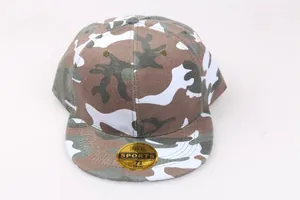 Close-up of camouflage flat brim snapback hat with 58cm size label on the visor