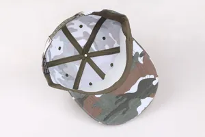 Detail view of camouflage baseball cap interior with polyester wash label and strap