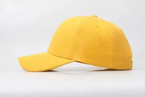 Side view of a bright yellow cotton baseball cap with a curved brim and six-panel structure