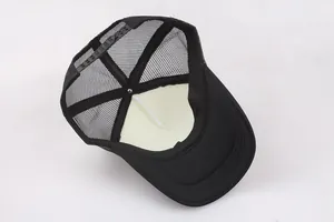 Black mesh trucker hat with adjustable snapback closure and breathable foam front panel